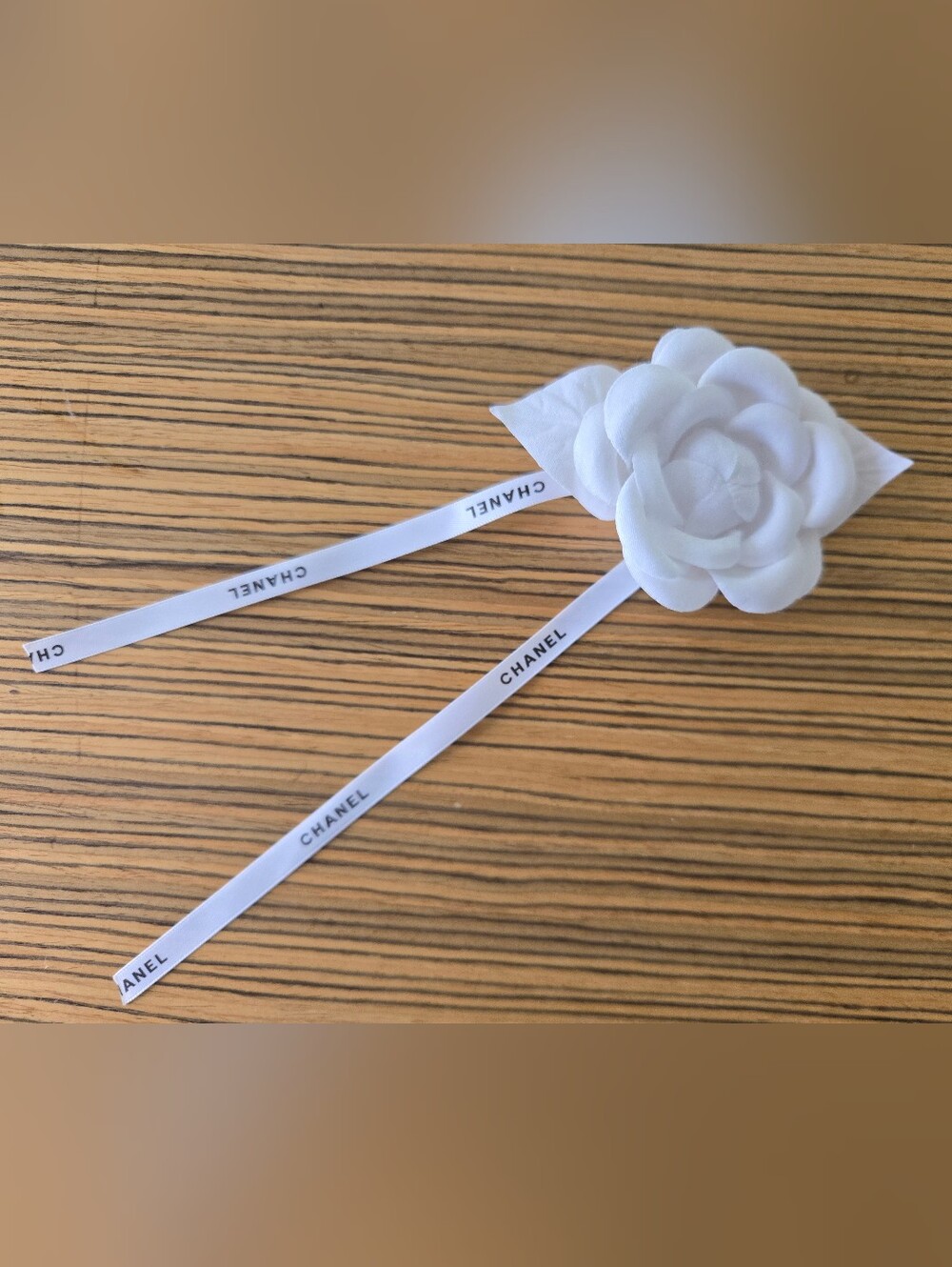 CHANEL White Camellia Ribbon Brooch with Branded Streamers